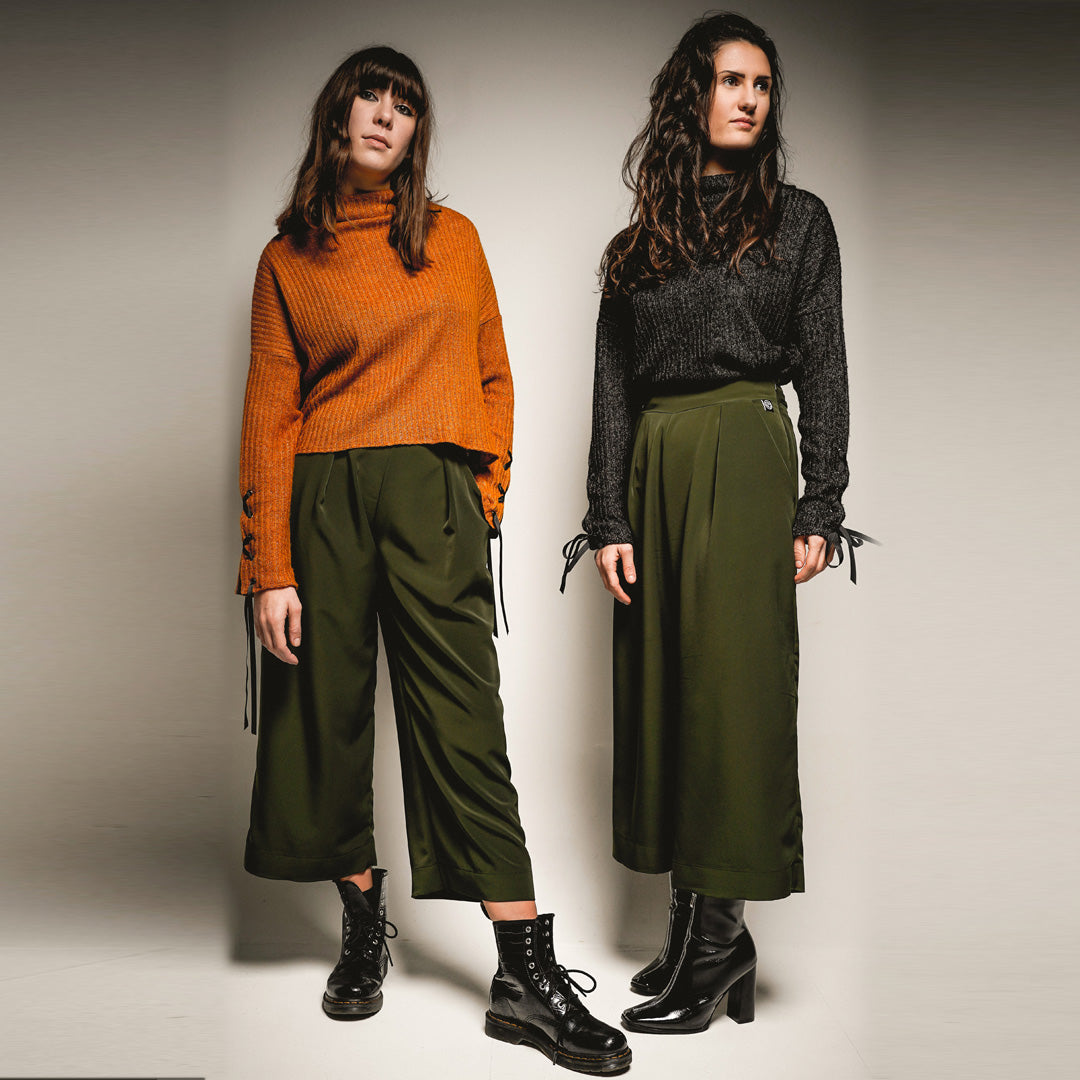 Green culottes with black and orange knitted jumper out of sync sisters